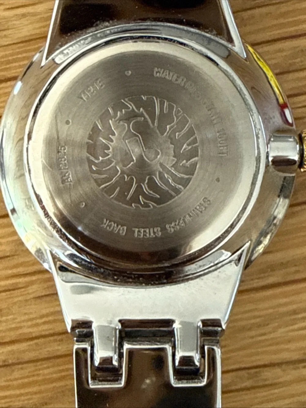Anne Klein Watch w/ Mother Of Pearl Face. Silver & Gold Tone Adjustable Bracelet